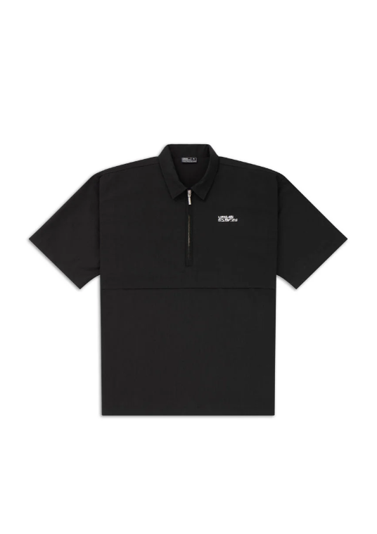 Screenshot 2025-11-25 195421 HALF-ZIP TECH POLO